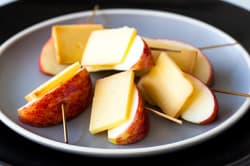 The sharpness of cheddar cheese complements the sweet, juicy crunch of apples.